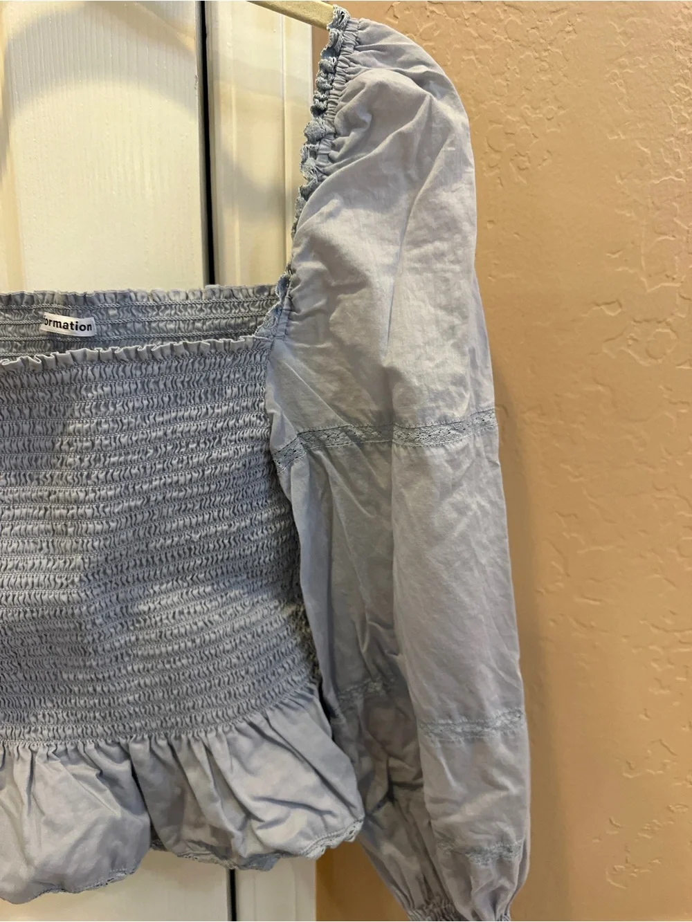Reformation Roland Smocked Top in Mineral Blue